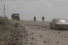 A moment after the bombardment of the convoy by the Georgian aircraft on the road from Tshinvali to Russia, Monday August 11, 2008. 