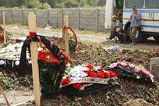 The new graves of the victims of the war in Ossetia near Vladikavkaz, Wednesday August 13, 2008. 