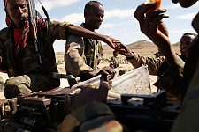 The pick-up truck with a large-caliber machine-gun installed in it. Los Anod, SomaliLand, Tuesday, October 16, 2007. The military constantly camp near Los Anod in the province of  SomaliLand, bordering on PuntLand. Fighting is resumed at this territory from time to time.