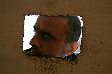 The patients of the secure ward condemned for serious crimes undergo compulsory treatment here. Mental hospital not far from Sukhumi, Abkhasia, Friday, March 17, 2006. About a hundred patients and several members of the staff are placed in a small two-storeyed building. It's the only hospital of the kind in Abkhasia which was badly damaged in the war. The hospital could never do without its head physician Konstantin Anua.