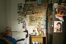 A man resting in his room. Habana, Cuba, Friday, Feb. 23, 2007. A beautiful building of a former convent was turned into an old people’s home in 1965. Old people without families and those who are unable to move live here permanently. The rest come for breakfast and return home for the night. Every week elderly people hold theatre shows or recitals, where guest artist or inhabitants themselves perform.
