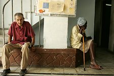 Old people’s home residents. Habana, Cuba, Friday, Feb. 23, 2007. A beautiful building of a former convent was turned into an old people’s home in 1965. Old people without families and those who are unable to move live here permanently. The rest come for breakfast and return home for the night. Every week elderly people hold theatre shows or recitals, where guest artist or inhabitants themselves perform.