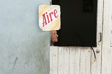 A little business of on old woman - pumping up tyres. Bayamo, Cuba, Wednesday, March 14, 2007.