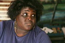 A shopwoman in a village shop. Bayamo, Cuba, Sunday, March 11, 2007.