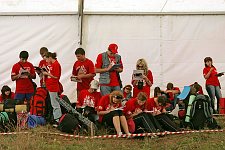 Activists of the pro-Kremlin Nashi (Ours) youth movement filling in registration forms in the Nashi summer camp on Lake Seliger, some 300 kilometres (~180 miles) northwest of Moscow, Sunday, July 15, 2007. Pro-Kremlin Nashi (Ours) youth movement has assembled about 10 thousand young people from all over Russia to a summer camp where they are going to do sports and attend political and socially oriented lectures and training sessions for two weeks.