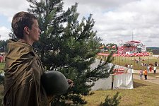 Activist of the pro-Kremlin Nashi (Ours) youth movement performs the Bronze Soldier as a protest against the transfer of war remains in Estonia. The Nashi summer camp on Lake Seliger, some 300 kilometres (~180 miles) northwest of Moscow, Tuesday, July 17, 2007. Pro-Kremlin Nashi (Ours) youth movement has assembled about 10 thousand young people from all over Russia to a summer camp where they are going to do sports and attend political and socially oriented lectures and training sessions for two weeks.