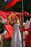 Group wedding ceremony in the camp. More than 25 couples got married at the same time, and following the call of president Putin to inprove the demography situation in Russia, promised to give birth to 3 children or more. The Nashi summer camp on Lake Seliger, some 300 kilometres (~180 miles) northwest of Moscow, Wednesday, July 18, 2007. Pro-Kremlin Nashi (Ours) youth movement has assembled about 10 thousand young people from all over Russia to a summer camp where they are going to do sports and attend political and socially oriented lectures and training sessions for two weeks.