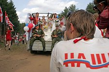 Group wedding ceremony in the camp. More than 25 couples got married at the same time, and following the call of president Putin to inprove the demography situation in Russia, promised to give birth to 3 children or more. The Nashi summer camp on Lake Seliger, some 300 kilometres (~180 miles) northwest of Moscow, Wednesday, July 18, 2007. Pro-Kremlin Nashi (Ours) youth movement has assembled about 10 thousand young people from all over Russia to a summer camp where they are going to do sports and attend political and socially oriented lectures and training sessions for two weeks.