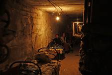 Patients in the basement of the ruined hospital, Monday August 11, 2008. 