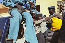 The police wagon is going to the court. The police station El Imam Malik in the Omdurman, the suburb of the capital. Khartoum, Sudan. Monday, Dec. 22, 2003.