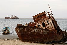 Iron wrecks of  fishing boats on the seashore and in the roads of the Arabic Sea. Berbera, SomaliLand, Wednesday, October 3, 2007. For 16 years Somaliland has already been an actually independent state. It has its own constitution, relatively stable political system and comparatively efficient government, army, police as well as the currency of it's own. Nevertheless not a single country has so far recognized the sovereignty of Somaliland.