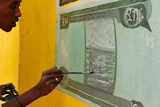 An artist painting a banknote on the exchange office wall. Hargeisa, SomaliLand, Thursday, October 11, 2007. For 16 years Somaliland has already been an actually independent state. It has its own constitution, relatively stable political system and comparatively efficient government, army, police as well as the currency of it's own. Nevertheless not a single country has so far recognized the sovereignty of Somaliland.