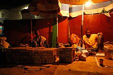 Street money changers at work. Hargeisa, SomaliLand, Tuesday, October 9, 2007. The largest denomination bank note in the country - 500 shillings - is equal to 8 American cents. Besides it 100 and 50 shilling banknotes are in circulation as well.